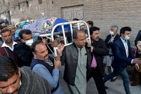 Gunmen kill priest and injured colleagues on their way back from church in pakistan.